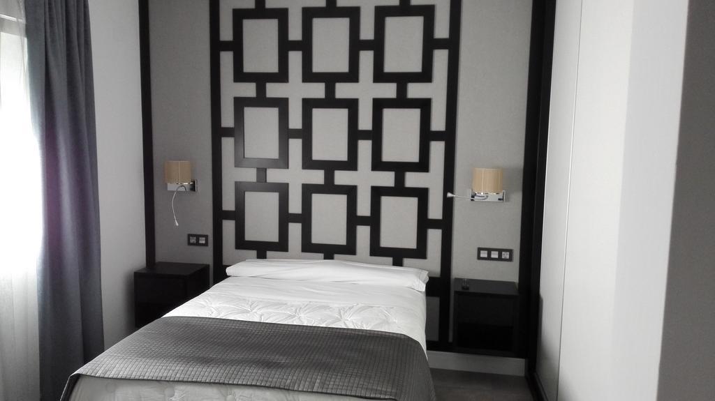 Apartamentos Las Palmeras Palma del Río Pokoj fotografie